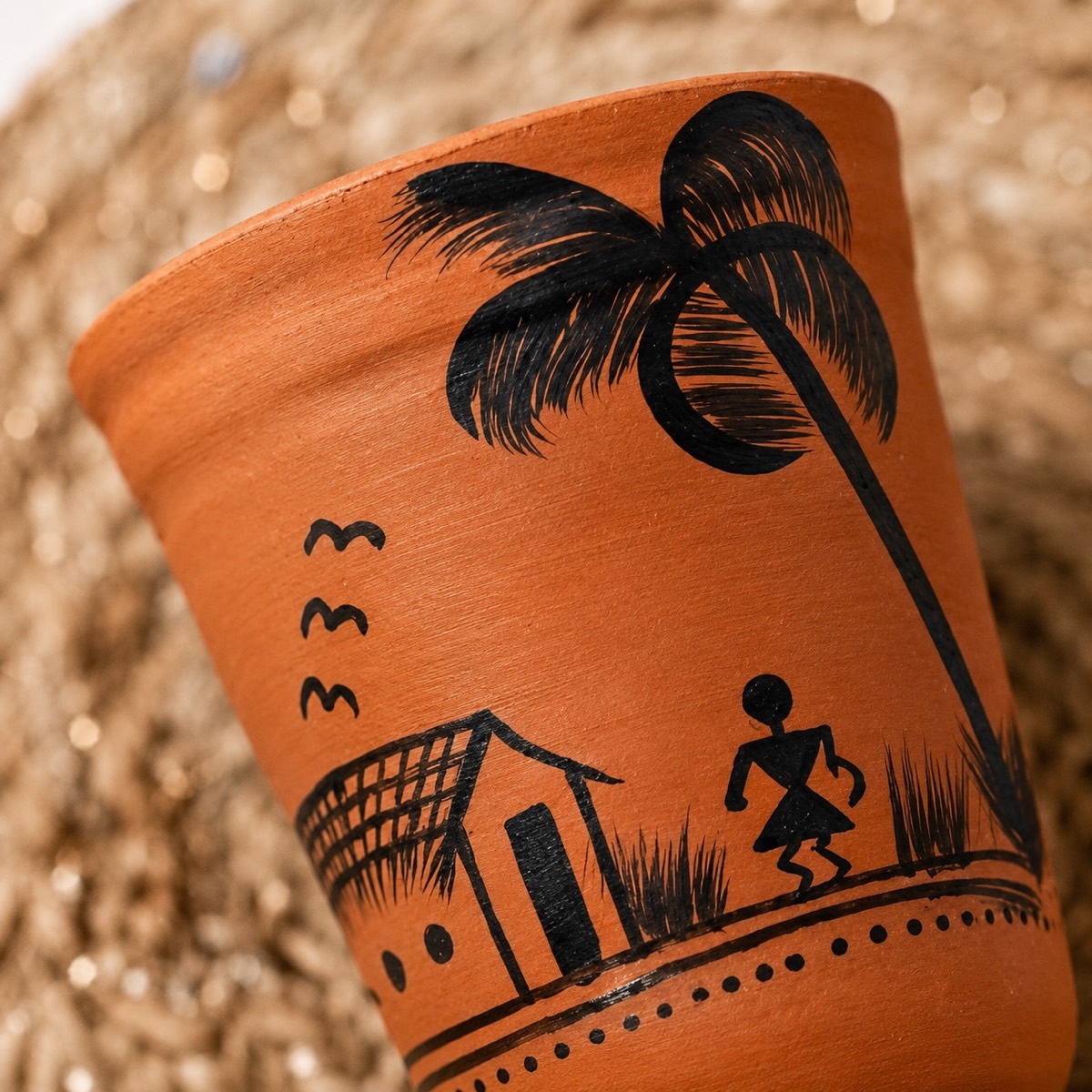 Terracotta diya packed in a kraft gift box with straw padding