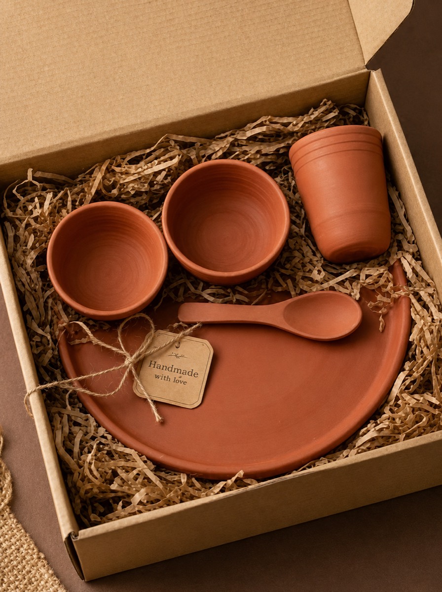Terracotta gift set packed in a box with straw padding and a handmade-with-love tag